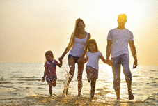 A family having fun at the beach.