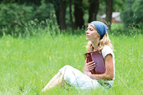 A young lady praying