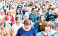 Crowd of people walking on the city street